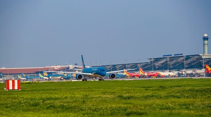 Sản lượng vận chuyển quốc nội qua sân bay Nội Bài vượt đỉnh cao trước dịch Covid-19. Riêng sản lượng quốc nội cao điểm hè năm nay tăng 30-35% so với cao điểm hè 2019 - Ảnh: Phan Công